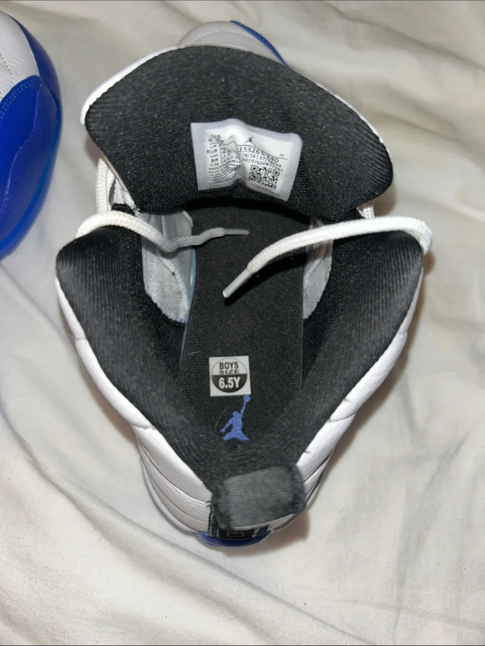 Jordan Men’s High-Top Sneakers in White and Blue